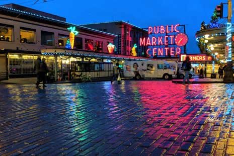public market sign and street at dawn